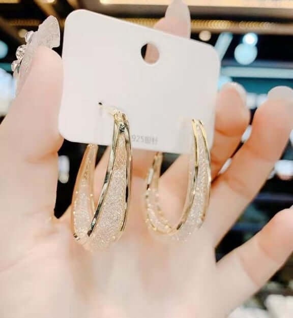 Ressa – Gedrehte ovale Creolen