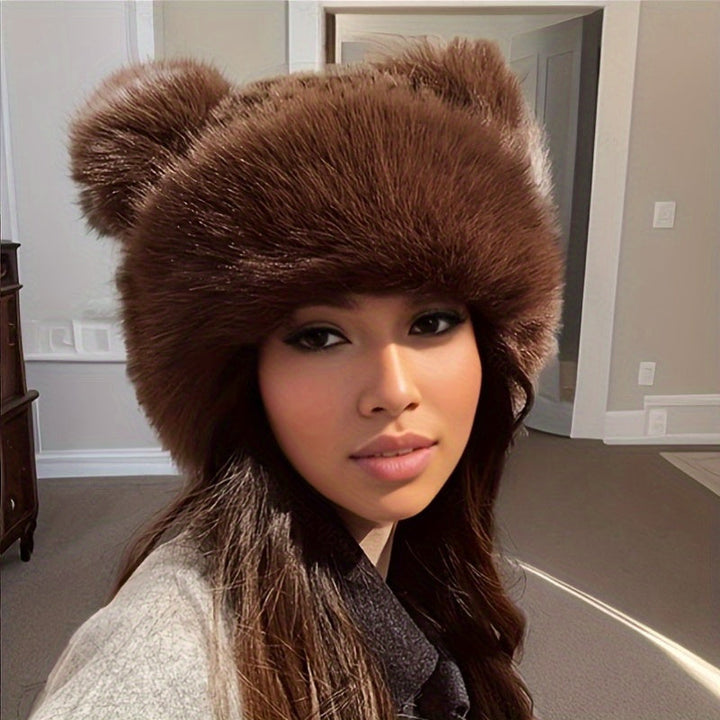 Avira – Warme Pompon-Mütze